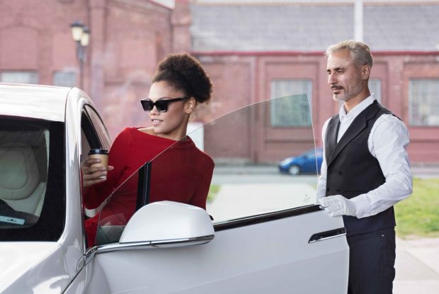 valet-parking-woman-s-car-side-view_11zon